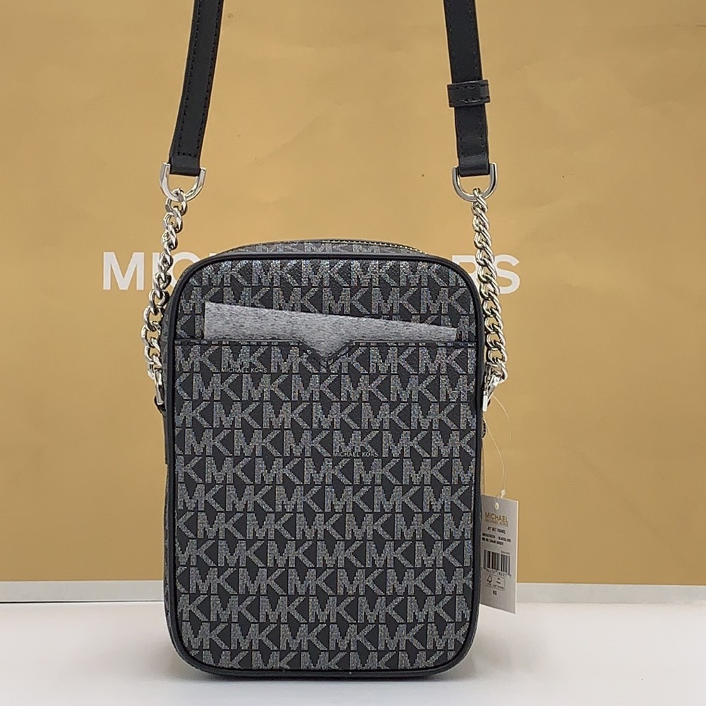 MICHAEL KORS
Jet Set Travel Medium Signature Logo Crossbody
COLOR BLACK SILVER - Picture 9 of 16